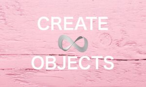 CREATE OBJECTS ピンク色にペイントされた板の上の無限マークとタイトル。